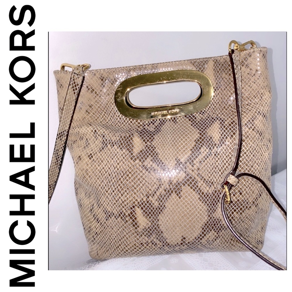 Michael Kors snakeskin cowboy bag with magnetic closure